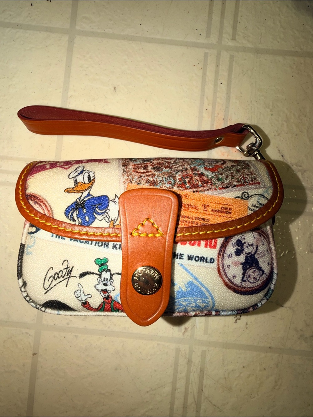 Dooney & Bourke Disney Patch Print Wristlet in Cream and Tan